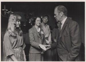 Janelle Hobbs ’81, Cassie Arnold SC’82, Leslie Del Guercio ’82, and Margaret Heagney ’83 meet President Gerald Ford at Redistricting conference held on December 4 & 5, 1980.